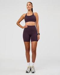 Woman wearing Rep Ultra High-Rise 6" Short Pockets - Midnight Plum-Marshmallow | Model:Rhiley | Size:S | Thumbnail Index: 3