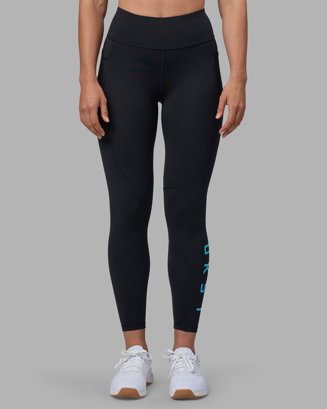 Woman wearing Rep Ultra High-Rise 7/8 Legging Pockets - Black-Blue Atoll | Model:Sophie | Size:S - view 7