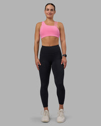 Woman wearing Rep Ultra High-Rise 7/8 Legging Pockets - Black-Candy Pink | Model:Keisha | Size:S | Thumbnail Index: 4