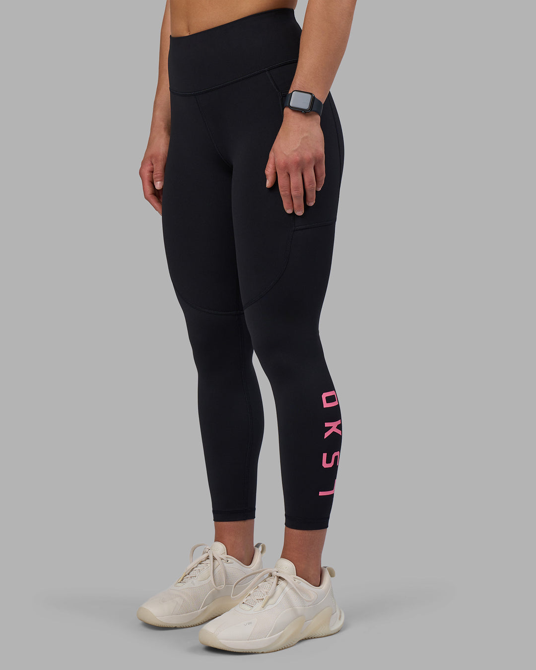 Woman wearing Rep Ultra High-Rise 7/8 Legging Pockets - Black-Candy Pink | Model:Keisha | Size:S - view 7