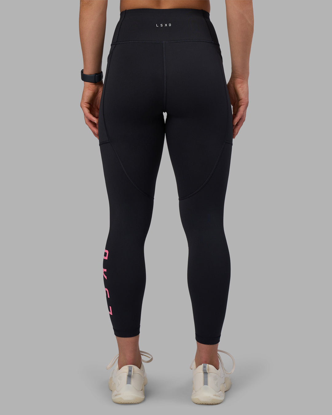 Woman wearing Rep Ultra High-Rise 7/8 Legging Pockets - Black-Candy Pink | Model:Keisha | Size:S - view 4
