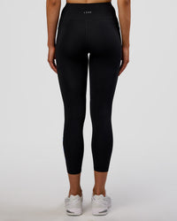 Woman wearing Rep Ultra High-Rise 7/8 Legging Pockets - Black-Electric Indigo | Model:Evie | Size:S | Thumbnail Index: 3