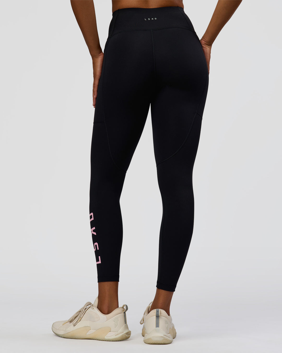 Woman wearing Rep Ultra High-Rise 7/8 Legging Pockets - Black-Marshmallow | Model:Rosie | Size:S - view 4