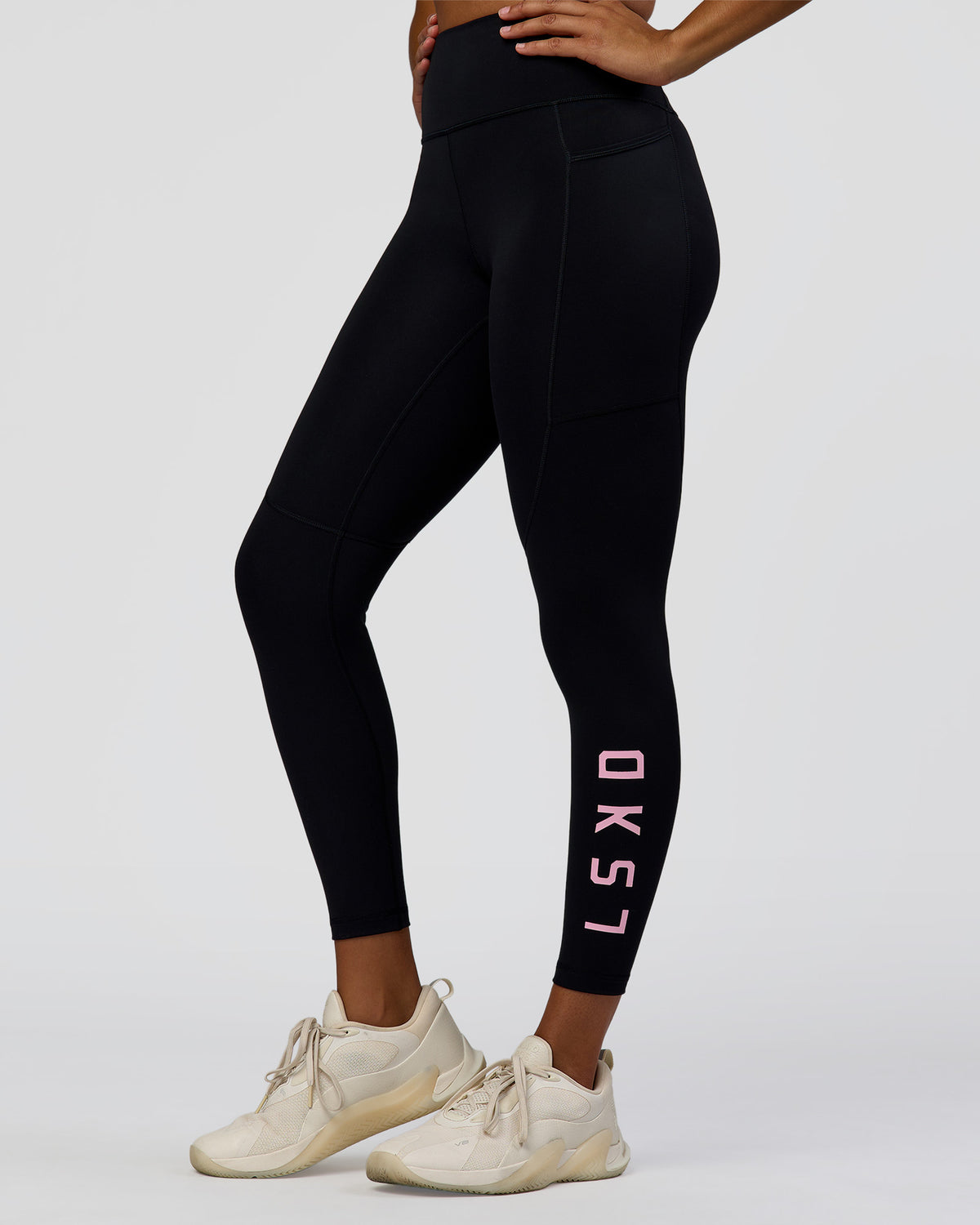 Woman wearing Rep Ultra High-Rise 7/8 Legging Pockets - Black-Marshmallow | Model:Rosie | Size:S