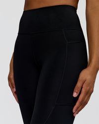 Woman wearing Rep Ultra High-Rise 7/8 Legging Pockets - Black-Marshmallow | Model:Rosie | Size:S | Thumbnail Index: 4