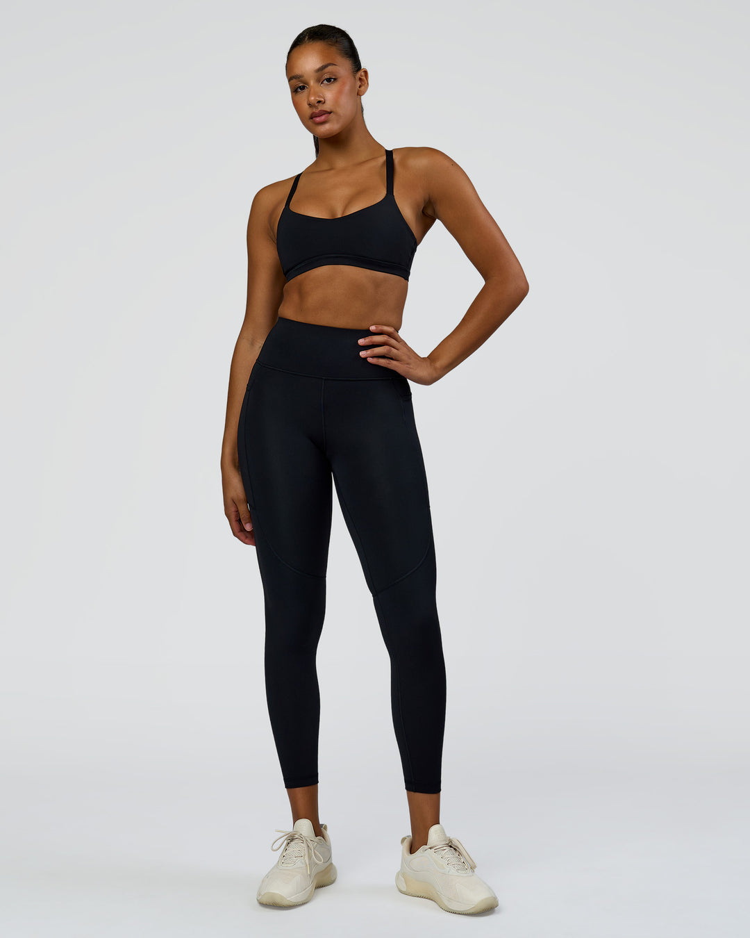 Woman wearing Rep Ultra High-Rise 7/8 Legging Pockets - Black-Palace Blue | Model:Rosie | Size:S - view 2