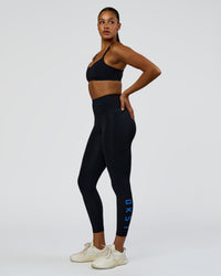 Woman wearing Rep Ultra High-Rise 7/8 Legging Pockets - Black-Palace Blue | Model:Rosie | Size:S | Thumbnail Index: 4