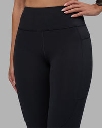 Woman wearing Rep Ultra High-Rise 7/8 Legging Pockets - Black-Power Cobalt | Model:Rhiley | Size:S | Thumbnail Index: 6