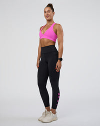 Woman wearing Rep Ultra High-Rise 7/8 Legging Pockets - Black-Ultra Fuchsia | Model:Abbey | Size:S | Thumbnail Index: 4
