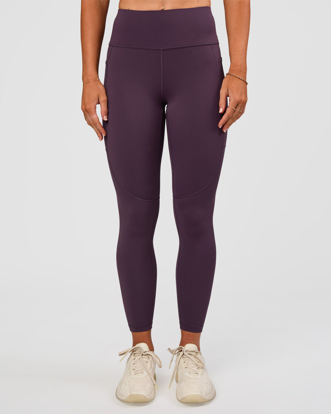 Woman wearing Rep Ultra High-Rise 7/8 Legging Pockets - Midnight Plum-Marshmallow | Model:Emelia | Size:S - view 7