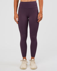 Woman wearing Rep Ultra High-Rise 7/8 Legging Pockets - Midnight Plum-Marshmallow | Model:Emelia | Size:S | Thumbnail Index: 6