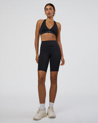 Woman wearing Rep Ultra High-Rise 9" Short Pockets - Black-Black | Model:Ruby | Size:S | Thumbnail Index: 1