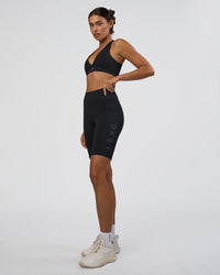 Woman wearing Rep Ultra High-Rise 9" Short Pockets - Black-Black | Model:Ruby | Size:S | Thumbnail Index: 4