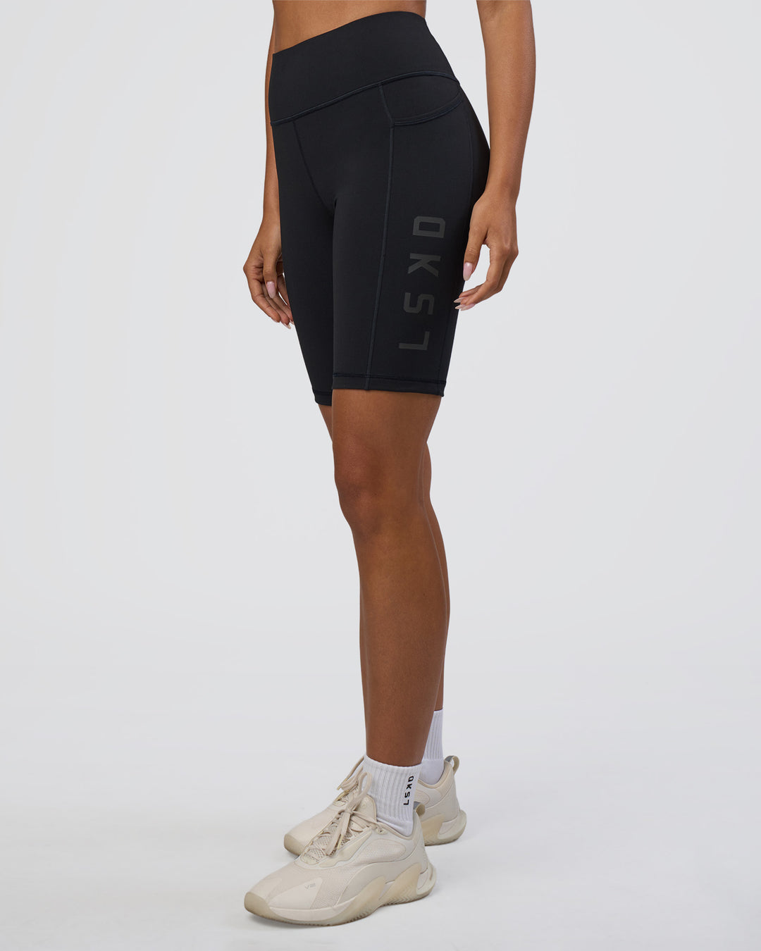Woman wearing Rep Ultra High-Rise 9" Short Pockets - Black-Black | Model:Ruby | Size:S - view 1
