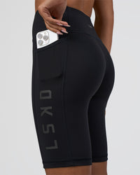 Woman wearing Rep Ultra High-Rise 9" Short Pockets - Black-Black | Model:Ruby | Size:S | Thumbnail Index: 2
