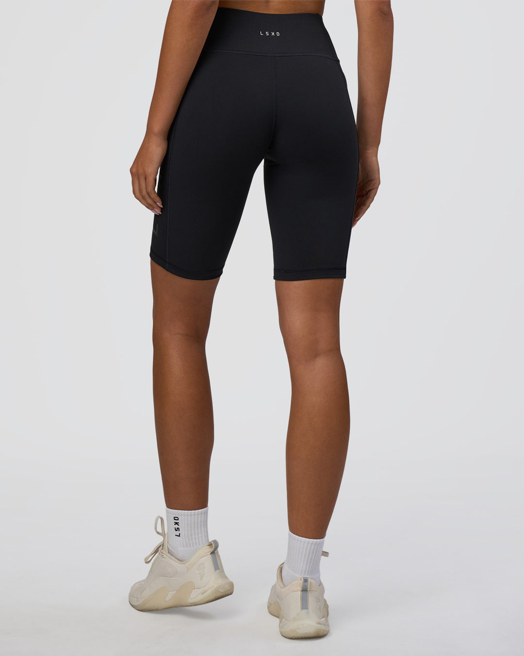 Woman wearing Rep Ultra High-Rise 9" Short Pockets - Black-Black | Model:Ruby | Size:S - view 4
