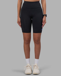 Woman wearing Rep Ultra High-Rise 9" Short Pockets - Black-Power Cobalt | Model:Rhiley | Size:S | Thumbnail Index: 6