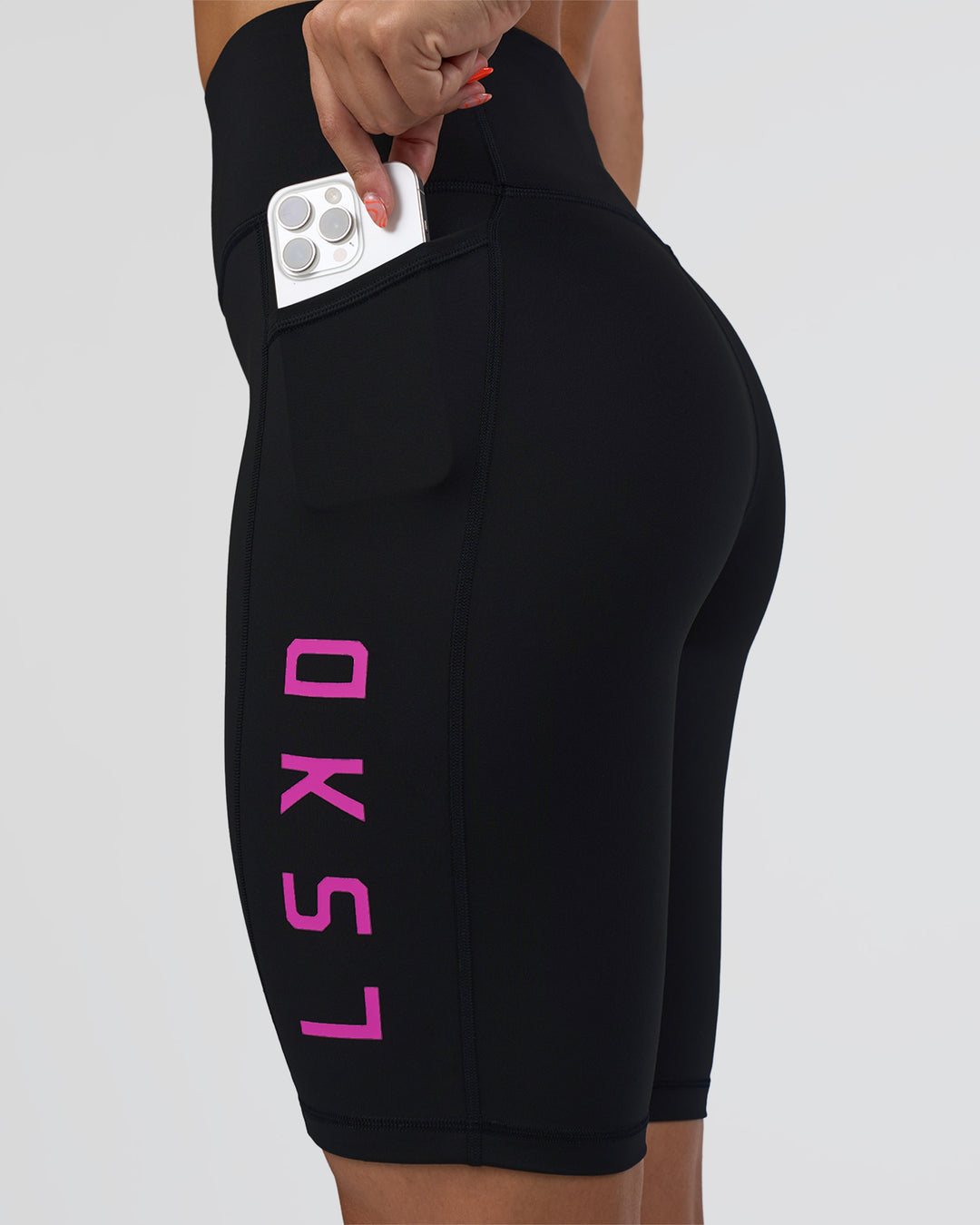 Woman wearing Rep Ultra High-Rise 9" Short Pockets - Black-Ultra Fuchsia | Model:Abbey | Size:S - view 6
