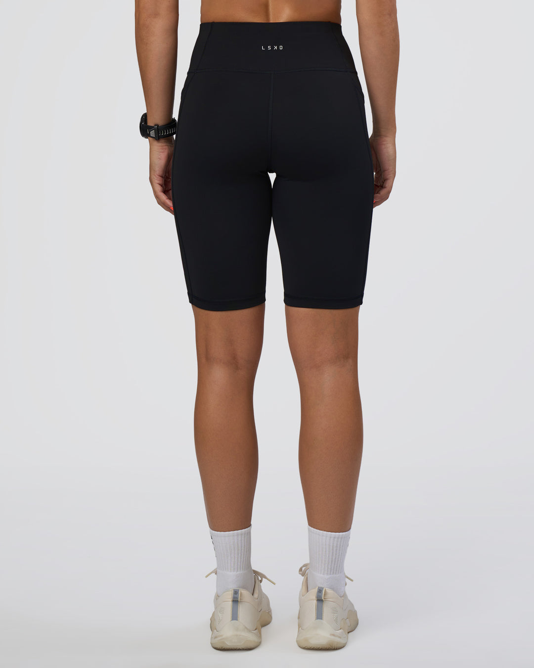 Woman wearing Rep Ultra High-Rise 9" Short Pockets - Black-Ultra Fuchsia | Model:Abbey | Size:S - view 4
