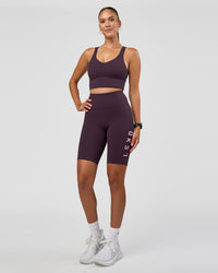 Woman wearing Rep Ultra High-Rise 9" Short Pockets - Midnight Plum-Marshmallow | Model:Rhiley | Size:S | Thumbnail Index: 6