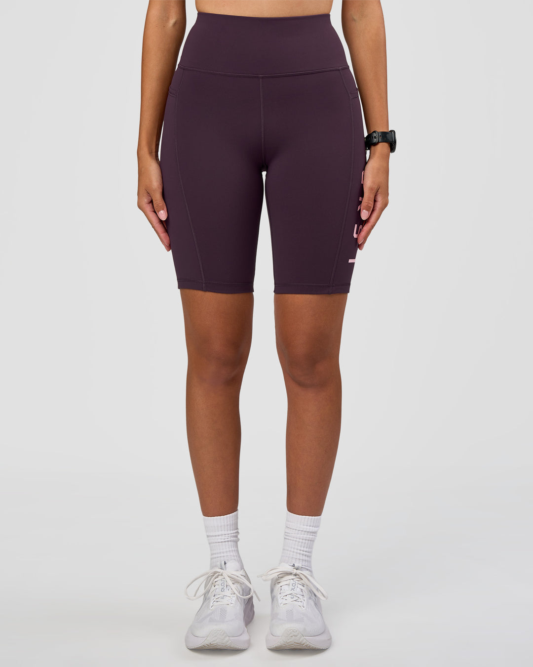 Woman wearing Rep Ultra High-Rise 9" Short Pockets - Midnight Plum-Marshmallow | Model:Rhiley | Size:S - view 10