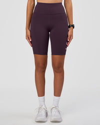 Woman wearing Rep Ultra High-Rise 9" Short Pockets - Midnight Plum-Marshmallow | Model:Rhiley | Size:S | Thumbnail Index: 9