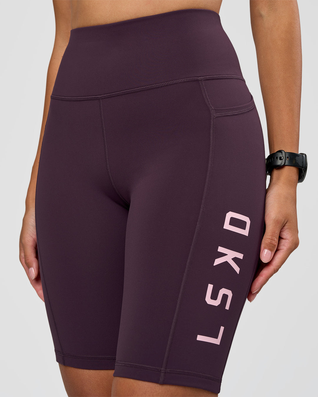 Woman wearing Rep Ultra High-Rise 9" Short Pockets - Midnight Plum-Marshmallow | Model:Rhiley | Size:S - view 9