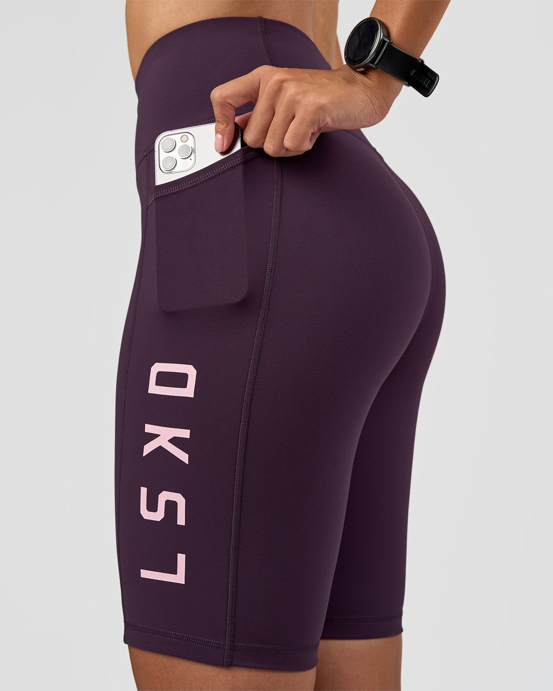 Woman wearing Rep Ultra High-Rise 9" Short Pockets - Midnight Plum-Marshmallow | Model:Rhiley | Size:S - view 6