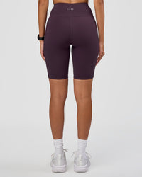 Woman wearing Rep Ultra High-Rise 9" Short Pockets - Midnight Plum-Marshmallow | Model:Rhiley | Size:S | Thumbnail Index: 7