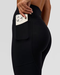 Woman wearing Rep Ultra High-Rise Full Length Legging Pockets - Black-Palace Blue | Model:Amity | Size:S | Thumbnail Index: 7