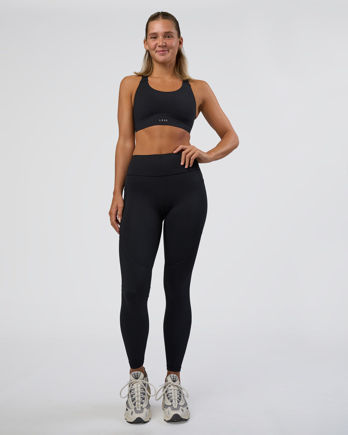 Woman wearing Rep Ultra High-Rise Full Length Legging Pockets - Black-Black | Model:Amity | Size:S