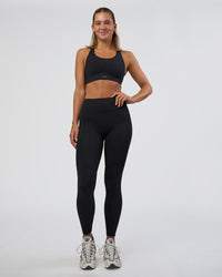 Woman wearing Rep Ultra High-Rise Full Length Legging Pockets - Black-Black | Model:Amity | Size:S | Thumbnail Index: 1