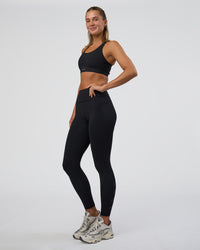 Woman wearing Rep Ultra High-Rise Full Length Legging Pockets - Black-Black | Model:Amity | Size:S | Thumbnail Index: 4