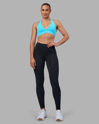 Woman wearing Rep Ultra High-Rise Full Length Legging Pockets - Black-Blue Atoll | Model:Sophie | Size:S | Thumbnail Index: 1