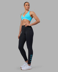 Woman wearing Rep Ultra High-Rise Full Length Legging Pockets - Black-Blue Atoll | Model:Sophie | Size:S | Thumbnail Index: 4