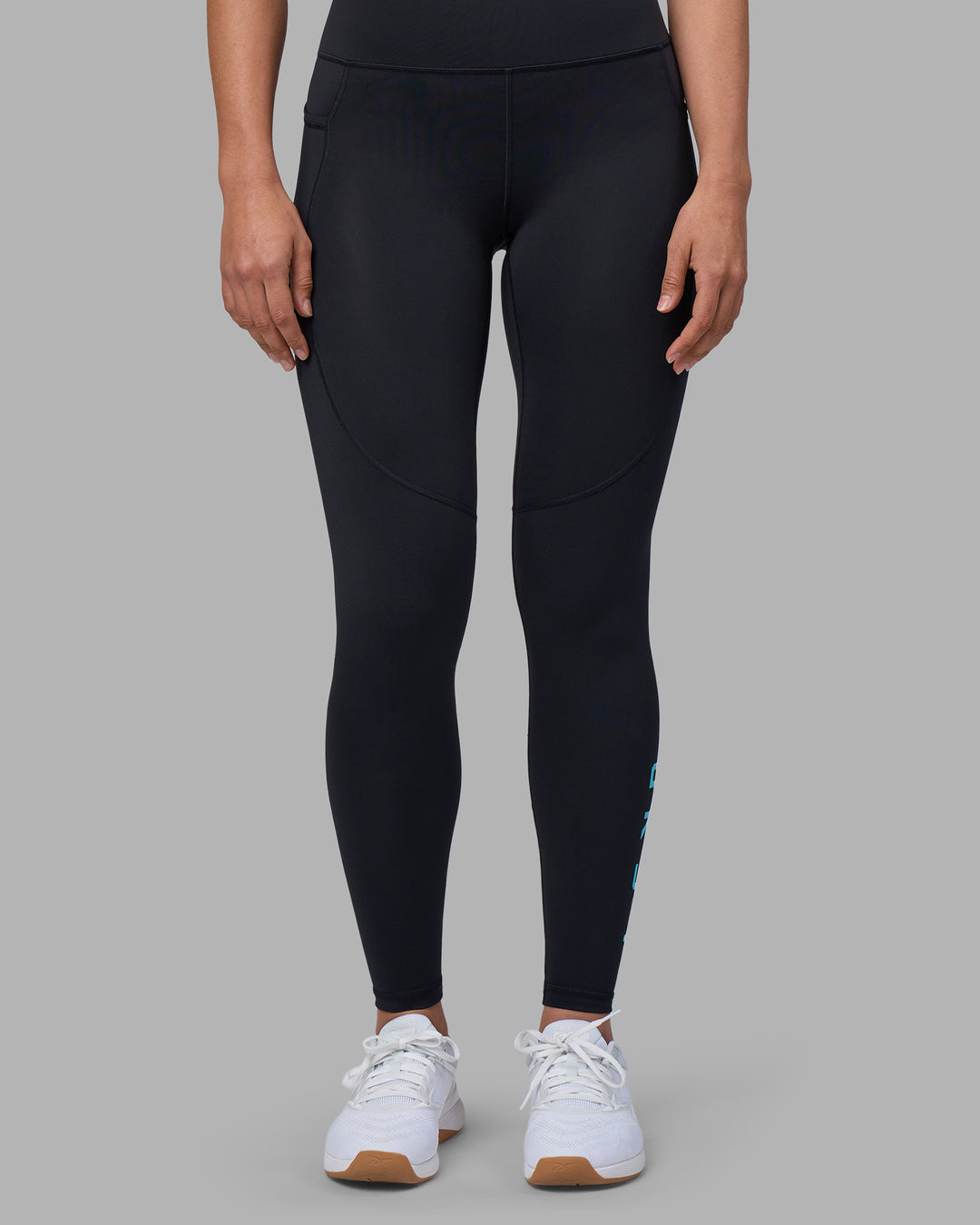 Woman wearing Rep Ultra High-Rise Full Length Legging Pockets - Black-Blue Atoll | Model:Sophie | Size:S - view 7