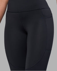 Woman wearing Rep Ultra High-Rise Full Length Legging Pockets - Black-Blue Atoll | Model:Sophie | Size:S | Thumbnail Index: 7