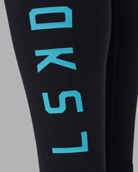 Woman wearing Rep Ultra High-Rise Full Length Legging Pockets - Black-Blue Atoll | Model:Sophie | Size:S | Thumbnail Index: 5