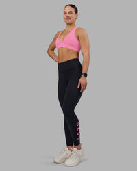 Woman wearing Rep Ultra High-Rise Full Length Legging Pockets - Black-Candy Pink | Model:Keisha | Size:S | Thumbnail Index: 1