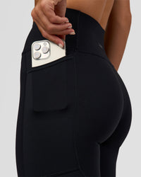 Woman wearing Rep Ultra High-Rise Full Length Legging Pockets - Black-Marshmallow | Model:Amity | Size:S | Thumbnail Index: 1