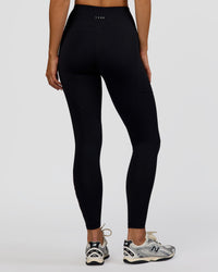 Woman wearing Rep Ultra High-Rise Full Length Legging Pockets - Black-Marshmallow | Model:Amity | Size:S | Thumbnail Index: 4