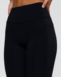 Woman wearing Rep Ultra High-Rise Full Length Legging Pockets - Black-Marshmallow | Model:Amity | Size:S | Thumbnail Index: 6