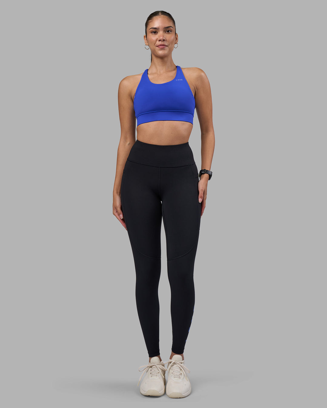Woman wearing Rep Ultra High-Rise Full Length Legging Pockets - Black-Power Cobalt | Model:Rhiley | Size:S - view 5