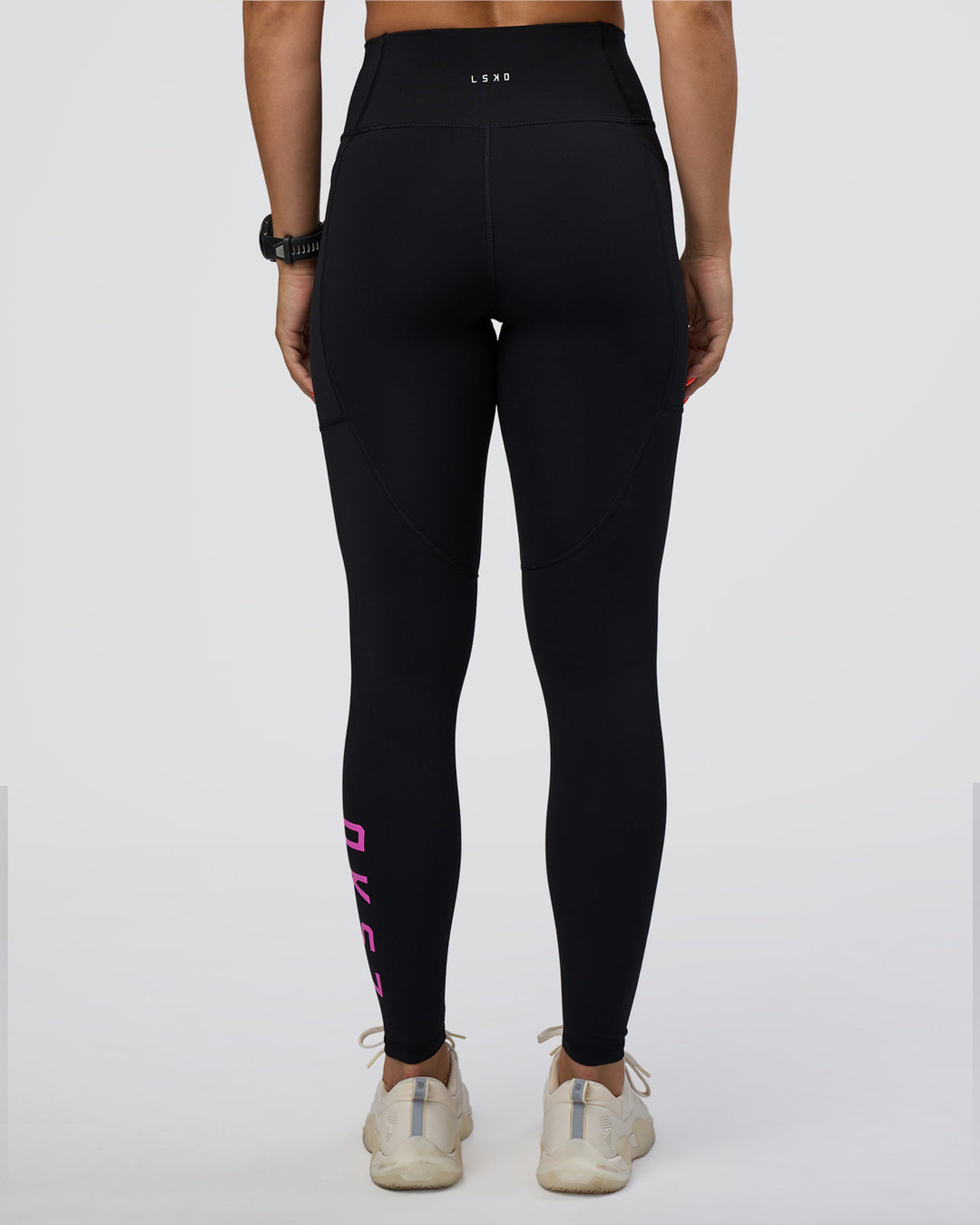 Woman wearing Rep Ultra High-Rise Full Length Legging Pockets - Black-Ultra Fuchsia | Model:Abbey | Size:S - view 4