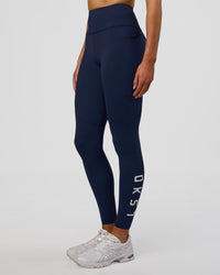 Woman wearing Rep Ultra High-Rise Full Length Legging Pockets - Future Navy-White | Model:Evie | Size:S | Thumbnail Index: 5