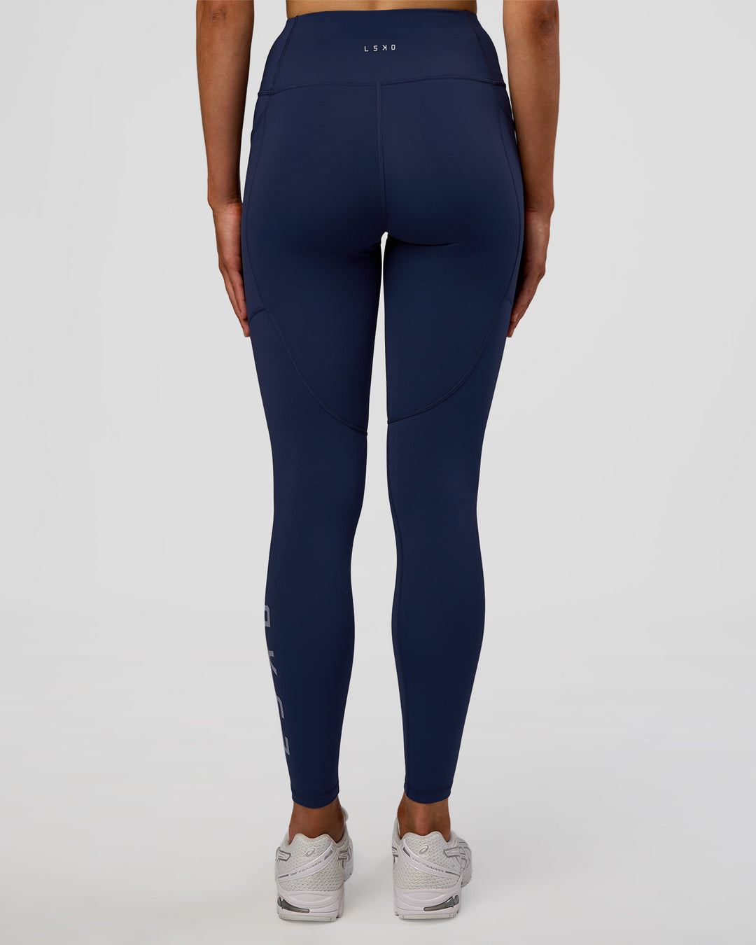 Woman wearing Rep Ultra High-Rise Full Length Legging Pockets - Future Navy-White | Model:Evie | Size:S - view 5