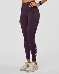 Woman wearing Rep Ultra High-Rise Full Length Legging Pockets - Midnight Plum-Marshmallow | Model:Rhiley | Size:S | Thumbnail Index: 5