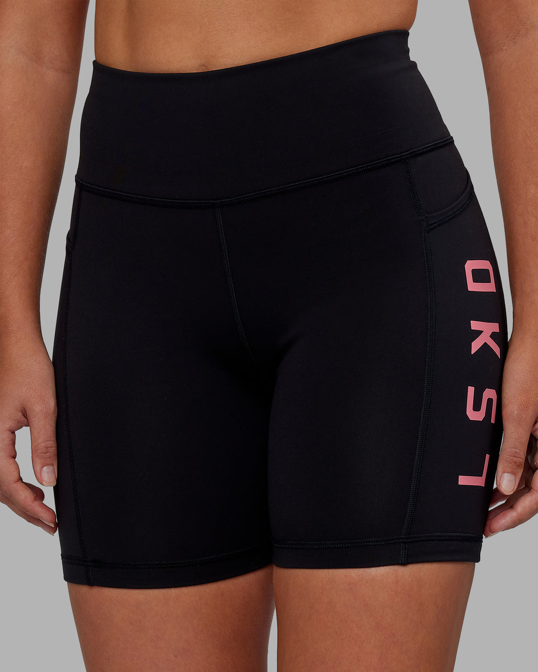Woman wearing Rep Ultra High-Rise 6" Short Pockets - Black-Pink Lemonade | Model:Hannah | Size:S - view 6