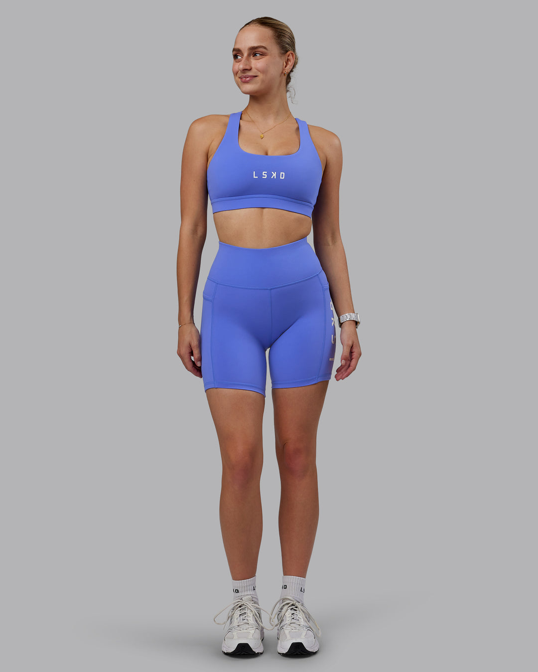 Woman wearing Rep Ultra High-Rise 6" Short Pockets - Baja Blue-White | Model:Lillie | Size:S - view 3