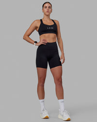 Woman wearing Rep Ultra High-Rise 6" Short Pockets - Black-White | Model:Shae | Size:S | Thumbnail Index: 10